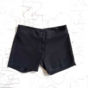 Black Stretchy Shorts with Zipper and Clip Closure.